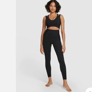 Nike women’s yoga Luxe black DRI-FIT jumpsuit NWT Size L